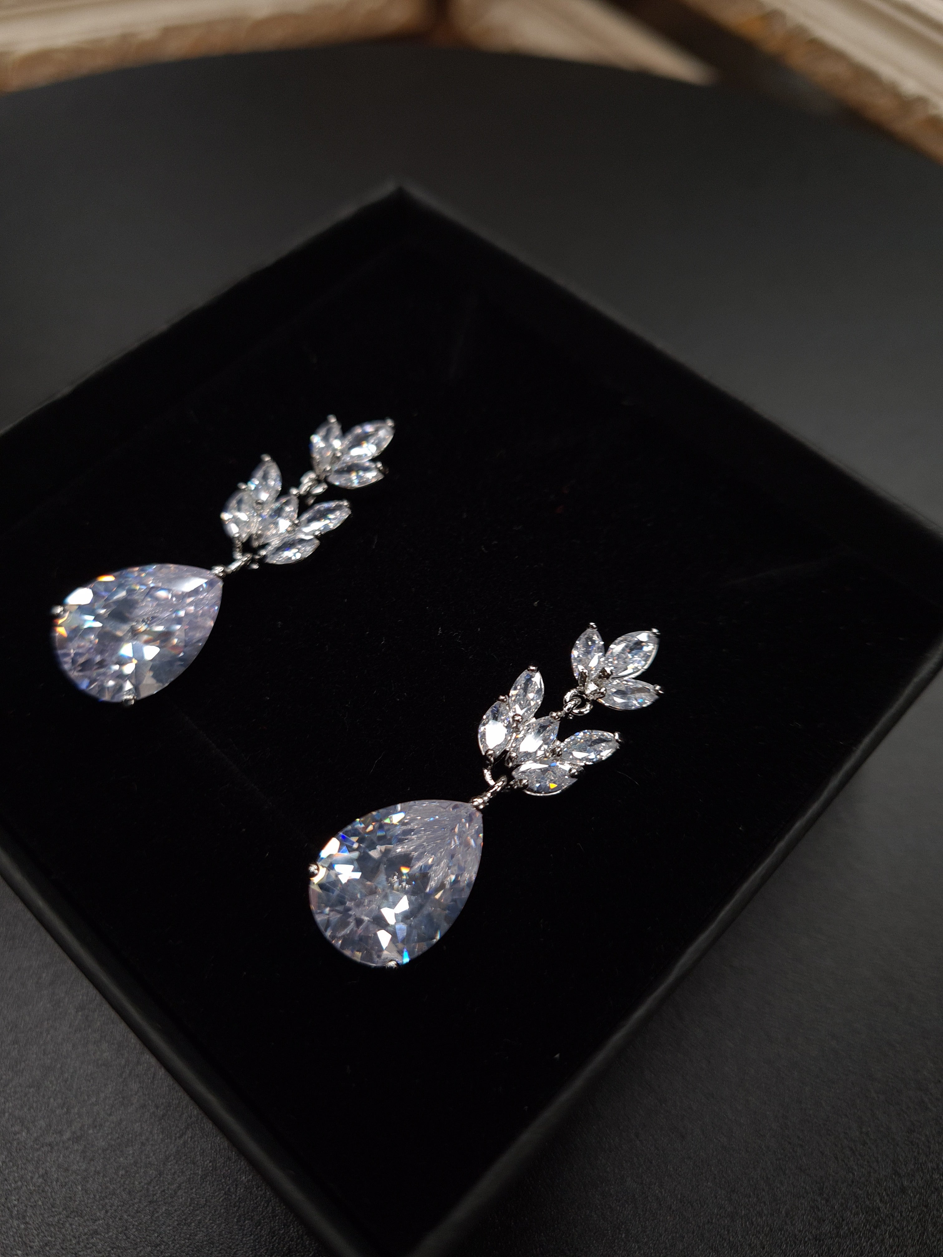 Crystal petals and teardrop earrings